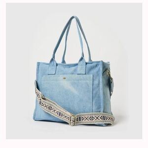 3 Graces brand denim bag. Multiple pockets. Cross body or handles.